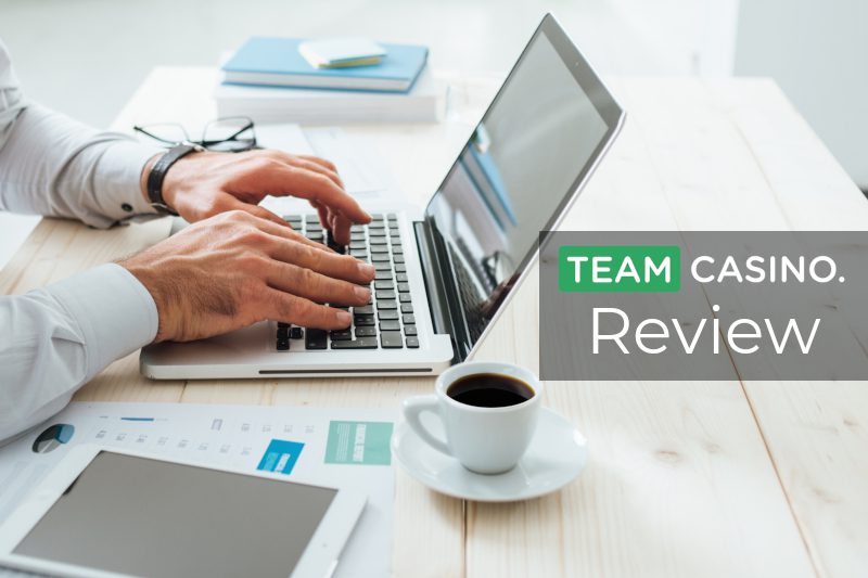 Man using TeamCasino on his laptop