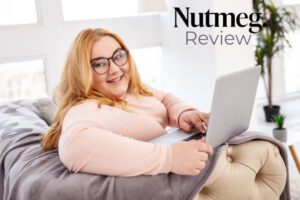 Woman working with laptop and text stating Nutmeg review